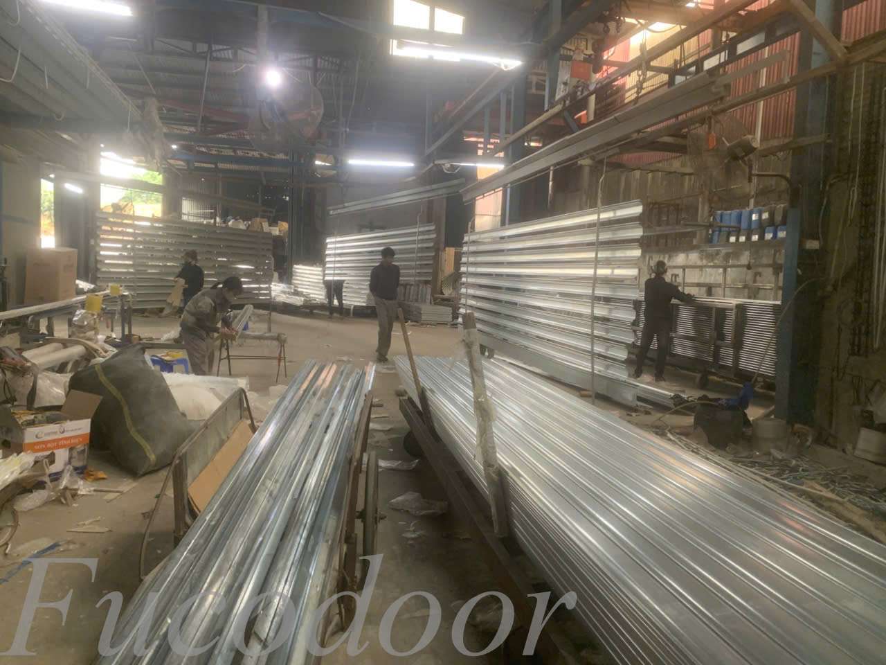 cửa cuốn công nghiệp siêu trường, cửa cuốn siêu trường siêu trọng, cửa cuốn thép siêu trường, cửa cuốn tấm liền siêu trường